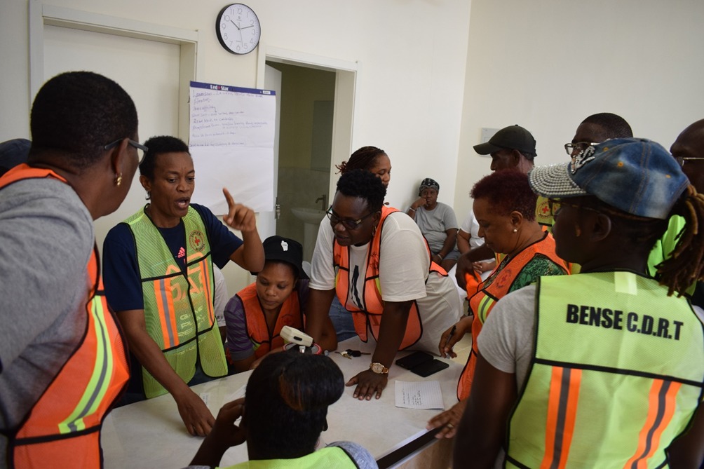 The Dominica Red Cross trains and helps form Community Disaster Response Teams to enhance resilience, promote disaster risk reduction, and strengthen early warning initiatives within communities.