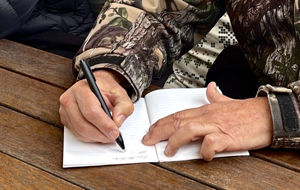 A PERC interviewee sketches out an idea on paper as part of a broader discussion on heat wave forecasting. June 2025.