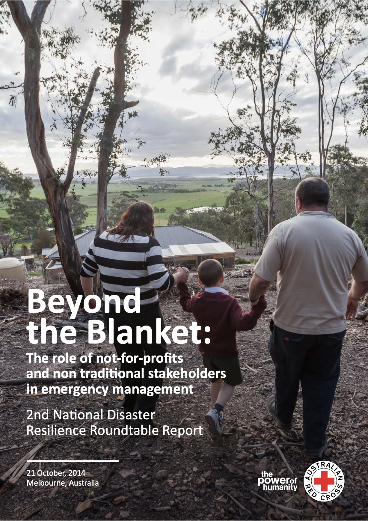Australian Red Cross report cover titled 'Beyond the Blanket: The Role of Not-for-Profits and Non Traditional Stakeholders in Emergency Management, 2nd National Disaster Resilience Roundtable Report, 21 October 2014, Melbourne, Australia.' The photo shows a family from behind, holding hands and walking through a wooded hillside overlooking green farmland and a house below.