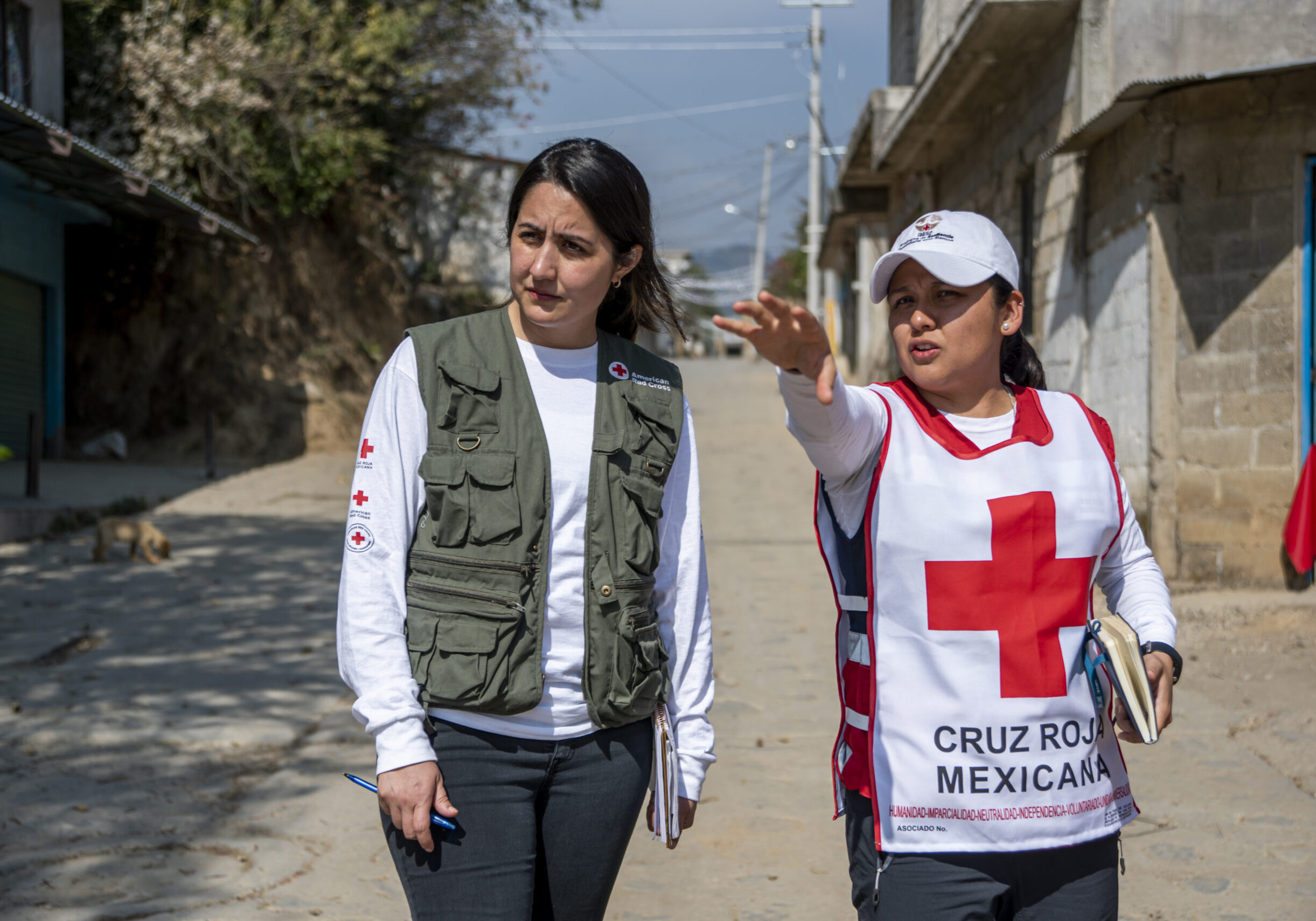 February 20, 2020. Metepec, Morelos, Mexico. Two years after a powerful earthquake struck Mexico, the American Red Cross, in partnership with the Mexican Red Cross and the Canadian Red Cross, continues to support communities affected by the disaster. Through a series of resiliency activities made possible through financial support from the American Red Cross, people living in disaster-prone communities in Mexico are empowered to learn skills that prepare them for future disasters. From providing hygiene and sanitation education to offering trainings on how to administer first aid, the Red Cross is actively involved in helping to build stronger, more resilient communities across the country.
Mexican Red Cross and American Red Cross workers conduct a walkthrough for the first disaster simulation set to take place on February 20, 2020 in Metepec, a city in Morelos, Mexico. 

Metepec residents are at risk of several potential disasters like volcano eruptions, earthquakes and forest fires. Through support from the Red Cross, disaster response volunteers are equipped with training and skills that allow them to conduct disaster simulations to help prepare their communities for potential disasters. On February 20, 2020, disaster response volunteers hosted their first simulation, which entailed alerting the community about a disaster and the need to evacuate. Disaster response volunteers practiced guiding community members to an evacuation meeting zone, administering first aid, and locating and evacuating the most vulnerable. Photo by Brad Zerivitz/American Red Cross