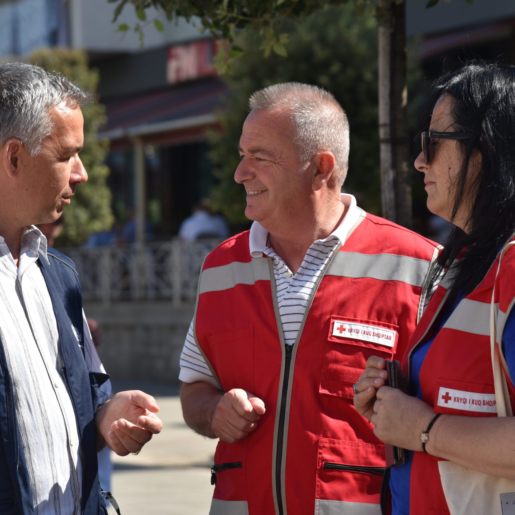 Fatos Xhengo (center) leads both disaster preparedness and response efforts at the Albanian Red Cross.